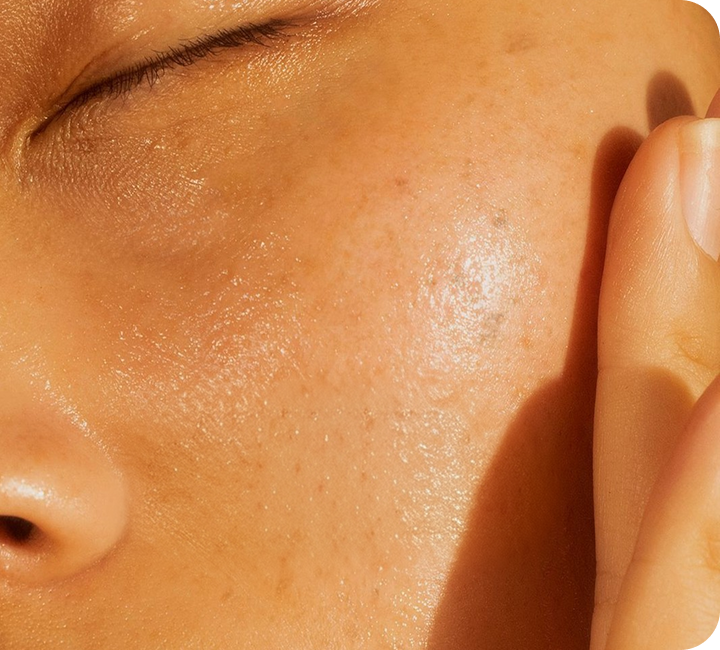 Close-up of dewy skin with mineral sunscreen applied